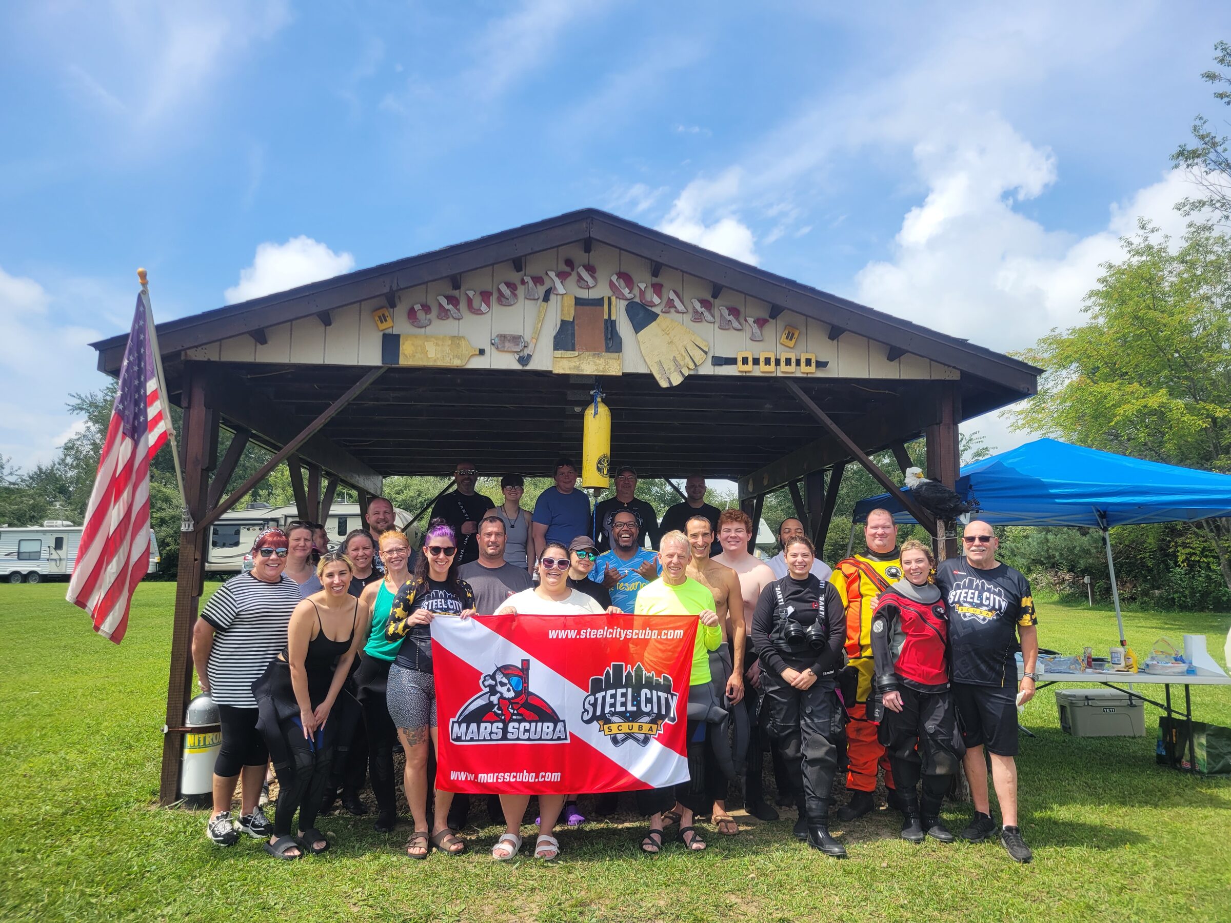 Three Rivers Dive Club members gathered under the Crusty's Quarry pavilion at last year's picnic